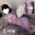 Woman in purple lace cheongsam lingerie with sheer bust-out design, holding a white fan.