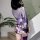 A woman models the yasu sexy deep-v anime kimono lingerie set, featuring a silky lavender top with floral patterns and a matc...