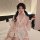 A woman wears a japanese-style sexy sleepwear set featuring a cute and seductive kimono robe adorned with bunny and maid deta...