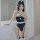 Sexy nurse costume for women featuring a tight-fitting bodysuit with lace details, stockings, and a nurse cap, perfect for ro...