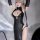 Elegant black leather look bodysuit with deep cut and thigh slit, featuring sensual design inspired by traditional qipao styl...