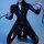 Sexy black bodysuit featuring glow-in-the-dark elements, perfect for cosplay or fetish wear with an open-crotch design and bo...