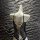 Glowing cloud sexy open-crotch leather bodysuit featuring cross-tie lace design and bell charm, perfect for women seeking ele...