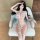 Woman lounging in qingruohan pure & tempting bikini set 8516 — sexy lingerie for small bust, no-remove hot outfit with floral...