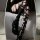 Edgy black thigh-high socks with ripped design and lace-up leg warmers for bold fashion statements.
