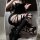 Edgy black y2k ripped thigh-high socks with lace-up leg warmers, perfect for bold fashion statements.