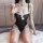 Adorable bunny girl lingerie set featuring sheer fabric, open-crotch design, and cute pom-pom accents for a playful, alluring...