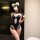 Woman wearing adorable dog bone lace bodysuit with sexy cut-outs, tight fit, and matching set.
