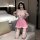 Adorable plus size pink and white maid costume lingerie set with lace trim, sheer panels, and thigh-high stockings.