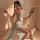 A woman poses elegantly in an aesthetic hanfu-inspired sleep set, featuring a minimalist design perfect for bedroom loungewea...