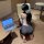 Woman wearing ai ru ru lacy mesh bodycon lingerie set, kneeling by laptop in office-themed sensual outfit with sheer details.