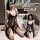 Woman posing in black sheer lace lingerie set with long robe, featuring delicate straps and seductive design for intimate wea...