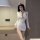 Sexy airline hostess costume set for women, featuring a plunging neckline and thigh-high skirt, perfect for role play with a ...