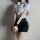 Woman wearing airu airu sexy flight attendant costume with white shirt and black skirt for police role play.