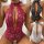 Sheer lace lingerie in red, black, and white with scalloped trim and deep v-neck design.