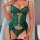 Woman wearing a deep v green lace bodysuit with sheer mesh panels and heart-shaped details, featuring adjustable straps and a...