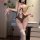 Woman modeling beige and brown bear-themed open-crotch bodysuit with lace trim, bows, and thigh-high stockings — sexy qqny li...