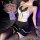 A woman poses elegantly wearing a white halter top with lace detailing and black stockings, paired with a stylish skirt, embo...