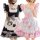 Two women wearing black and white cat girl cosplay costumes, featuring maid outfits with paw prints and ruffled details.