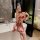 Woman wearing red butterfly embroidery lingerie set, vintage qipao-style sexy sleepwear for women, plus size option.