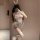 Woman in white bunny costume with sheer cut-out top, open-crotch design, lace trim, and fluffy tail — butterfly rain sexy lin...