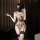 Woman wearing chao mu erotic lingerie set - thorny rose open-crotch bodysuit with adjustable ties, sensual & elegant design.