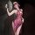 Woman in chao mu lace temptation lingerie, elegant split cheongsam-style erotic underwear with floral lace and fan.