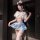 Woman wearing chao mu pure sailor-style lingerie set with flirty pleated skirt, white top, cat ears, and thigh-highs in a dim...