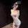 Woman in white chao mu seductive nurse costume lingerie with red cross, blindfold, and thigh-high stockings for adults.