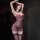 Woman wearing chao mu sensual lace bra set, elegant underwire lingerie with sheer floral design and matching garter stockings...