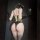Woman in chao mu sexy lingerie bodysuit with embroidered sheer open-cup and open-crotch design, posing for a mirror selfie.