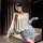 Woman wearing chaomu sensual lingerie dress, a one-shoulder backless cutout bodycon mini dress in soft gray, posing elegantly...