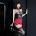 Woman wearing chaomu sexy strapless bodysuit with lace top, red high-waisted skirt, and thigh-high stockings in dark setting.