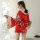 A woman models a red cherry blossom kimono lingerie set, featuring floral patterns and a bow detail, perfect for seductive ro...