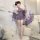Woman in purple lace cherry romance lingerie set with shawl and fan, elegant date night sleepwear.