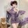 Woman in purple lace cherry romance lingerie set holding fan, with floral umbrella and teddy bear nearby.