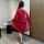 A woman models a sheer red chinese-style hanfu bodice sleep dress, featuring intricate gold embroidery and flowing sleeves, p...