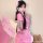 A woman wearing a pink chinese-inspired qipao dress, holding a matching fan, posing elegantly. perfect for cosplay or role pl...