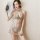 A woman poses elegantly in a sheer chinese-style lace cheongsam lingerie set, featuring intricate floral embroidery and delic...