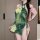 Seductive green floral design, backless qipao-inspired sexy outfit featuring delicate lace and pearl accents, perfect for cou...