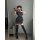A person poses with a fan, wearing a black floral chinese-style qipao dress paired with thigh-high stockings, ideal for role ...