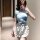 A woman models a chinese-style qipao lingerie set featuring a blue floral top with a white skirt, perfect for role play and i...