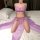 A woman wears a purple chinese-style sexy lingerie set, featuring a silk belly dance doudou as part of her cosplay hanfu slee...