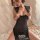 Seductive sheer black cheongsam mini skirt with open front and side slit, perfect for small busts.