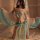 A woman poses elegantly wearing a chinese silk lingerie set inspired by hanfu, featuring delicate embroidery and flowing fabr...