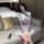 A stylish model showcases the chinese new year sexy lace cheongsam dress, featuring red silk-inspired design and bodycon fit,...