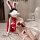 Sexy christmas bunny costume for women, featuring festive red and white fur details, perfect for holiday roleplay and naughty...