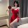 A woman poses elegantly in a red lace dress, holding a rose, perfect for festive holiday party wear. ideal for role play with...
