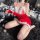 Sexy christmas-themed sleepwear set featuring a red mini skirt with white fur trim and lace lingerie, perfect for festive nig...