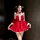 A charming model showcases a festive christmas red velvet babydoll dress set, featuring delicate lace details and playful bow...